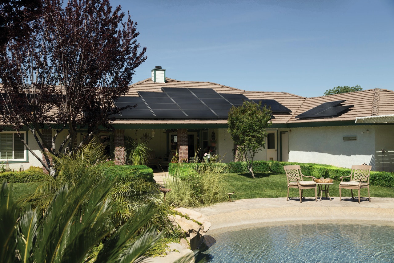 black-solar-panels-on-brown-roof-2850347